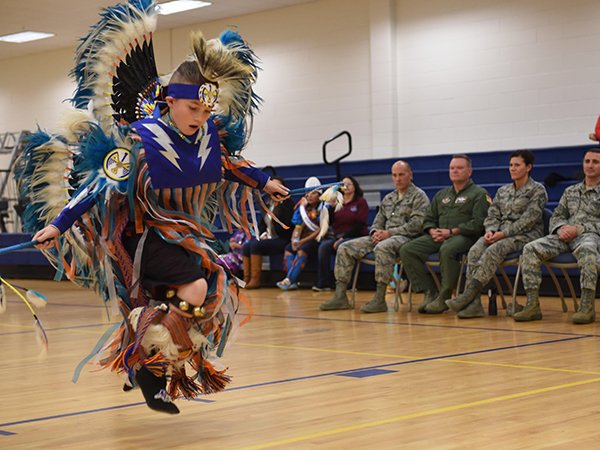 Child performs in Native American Stomp Dance.